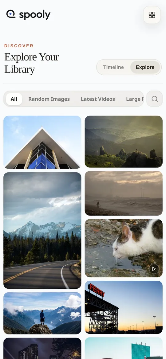 Library on a phone: a two-column grid of landscape and city photos